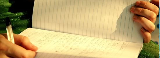 A girl looking through her diary