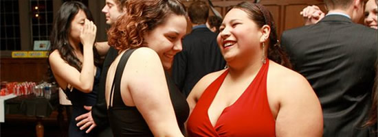 Two girls dancing together
