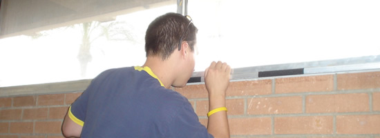 A guy watching someone through a window